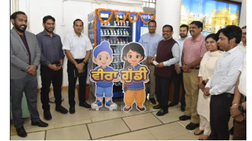 Chief-Secretary-K-a-p-Sinha-Launches-State-Of-The-Art-Vending-Machine-Dispensing-Milkfed-Products